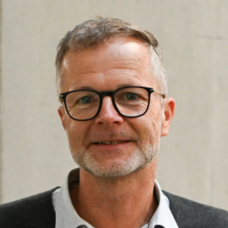 A simple, gray user icon on a light gray background, featuring a circle for a head and a rounded rectangle for the shoulders and body, often used as a placeholder for profile pictures at Hochschule Coburg.